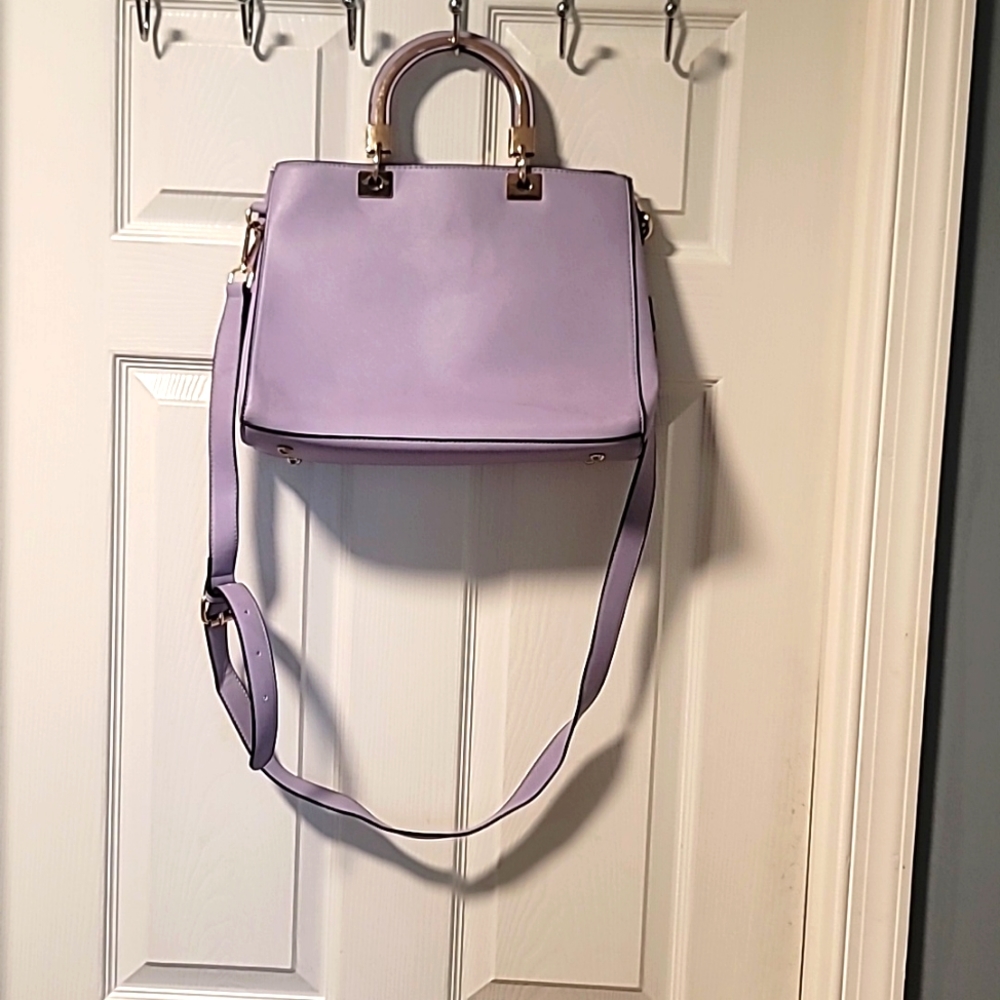 Lavender purse with cross body option. 13x10